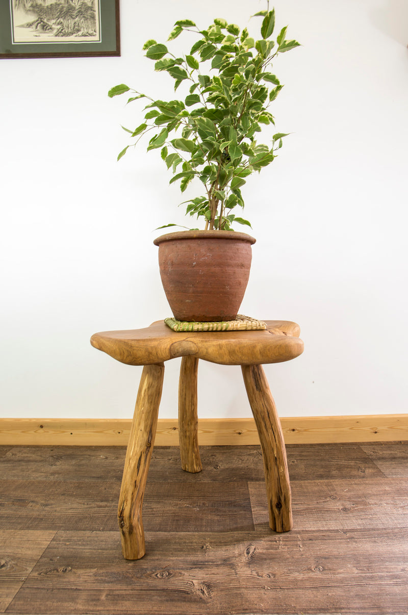 Unique three-legged side table